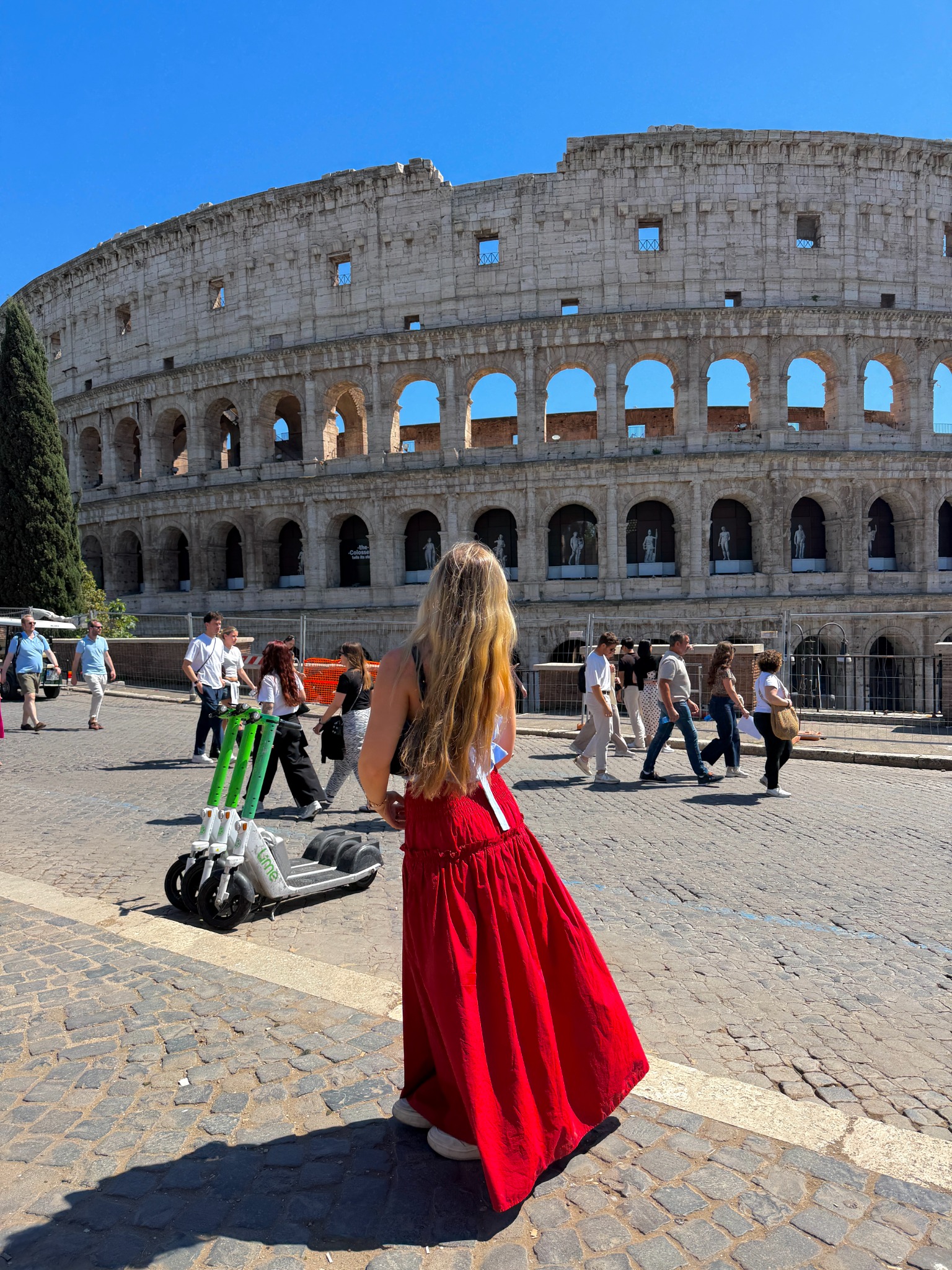 Kaylyn exploring Rome in front of the Colosseum